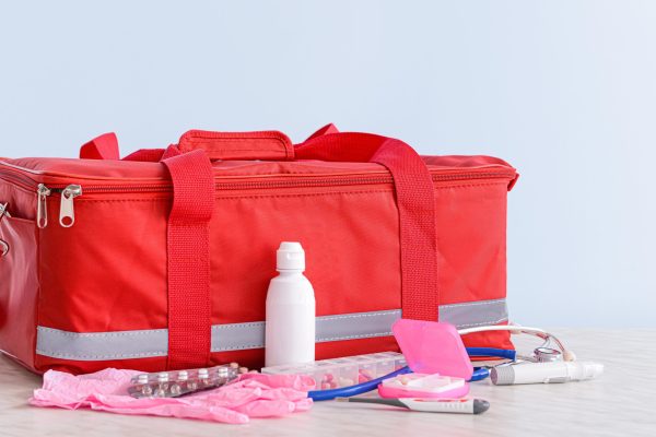 First aid kit concept, medicine equipment set in a suitcase box